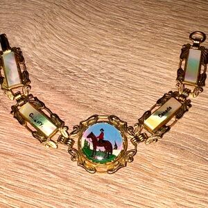 Vintage RCMP Gold tone and abalone panel bracelet